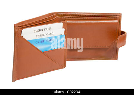 Portefeuille en cuir marron ouvert avec des cartes de crédit isolated on white Banque D'Images