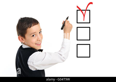 School boy wrighting avec cases à cocher pen isolated on white Banque D'Images