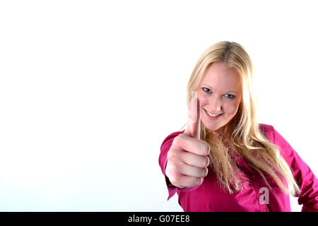 Très jolie jeune femme avec Thumbs up Banque D'Images