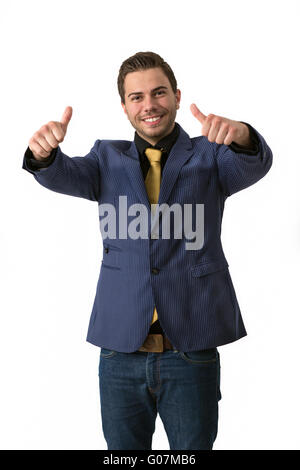 Un jeune homme sympathique doing Thumbs up Banque D'Images