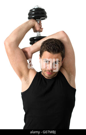 Young man working out with weights Banque D'Images
