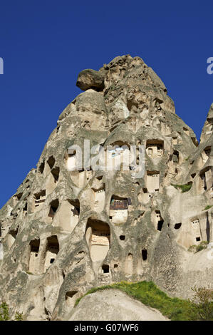 Creusé la roche de tuf, Cappadoce, Uchisar, Turquie Banque D'Images