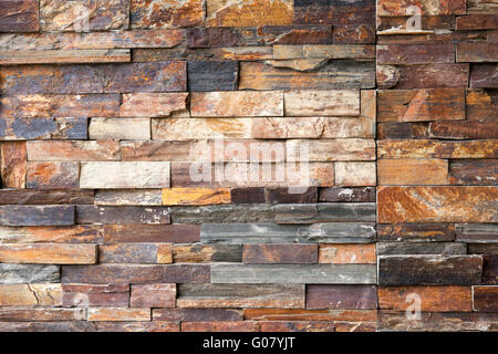 Mur de briques multicolores moderne rugueux texture Banque D'Images