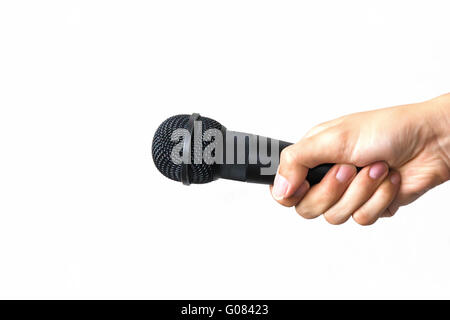 Main mâle avec microphone isolées sur fond blanc. Concept d'affaires et discours publics Banque D'Images