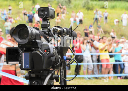 La couverture d'un événement avec une caméra vidéo. Banque D'Images