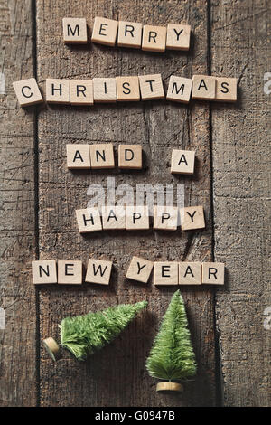 L'orthographe des lettres Scrabble Joyeux Noël sur bois Banque D'Images