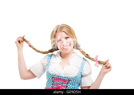 Femme bavaroise en dirndl holding blank, pancarte. Banque D'Images