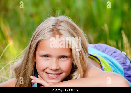 Smiling little blond girl Banque D'Images