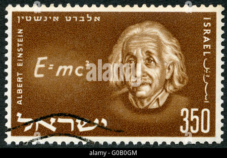 Israël - 1956 : montre Albert Einstein (1879-1955) et l'équation de sa théorie de la relativité Banque D'Images