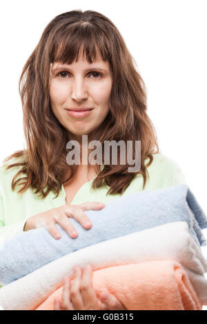 Woman holding spa serviettes blanc isolé Banque D'Images