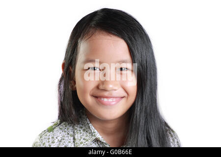 Portrait of a happy little Asian girl smiling isolated on white Banque D'Images