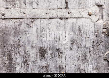 Texture cassante de couche de peinture sur un volet en bois Banque D'Images