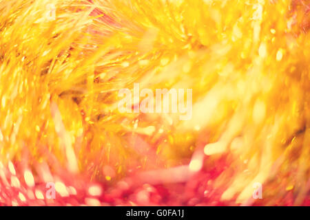 Lumières de Noël doré doux - arrière-plan flou de fête. Banque D'Images