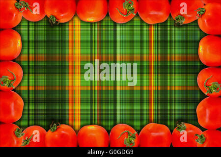 Checkered Background vert avec cadre de tomates Banque D'Images