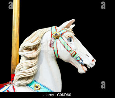 Tête d'un cheval de carrousel classique isolated on black with clipping path Banque D'Images