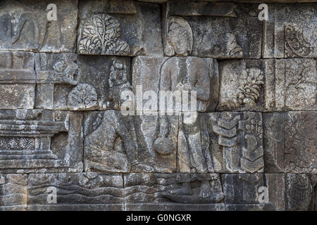 Reliefs en pierre ancienne temple de Borobudur Banque D'Images