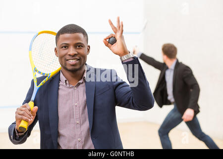 Les joueurs d'affaires Squash Banque D'Images