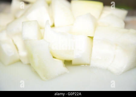 Melon d'hiver, le frêne blanc, courge, courge courge d'hiver, le suif gourd sans pépins, coupés en morceaux Banque D'Images