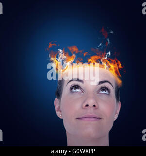 Image composite de close-up of Beautiful woman looking up Banque D'Images