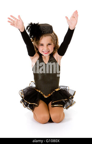 Petite fille danseuse dans divers costumes, isolé sur blanc. Banque D'Images