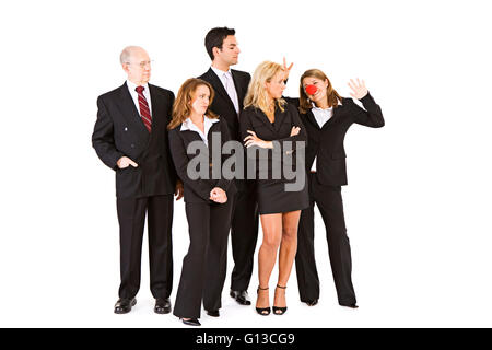 Groupe d'hommes et de femmes d'affaires dans diverses poses avec accessoires. Isolé sur fond blanc. Banque D'Images