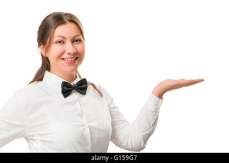 Portrait d'une belle horizontale waitress holding quelque chose dans sa main Banque D'Images