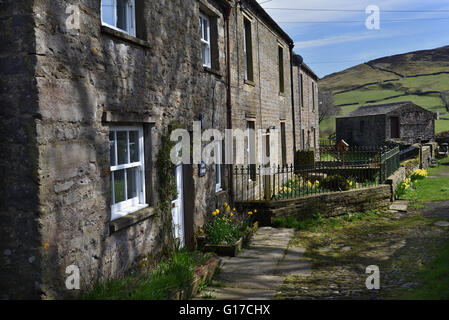 Keld, Swaledale, maison mitoyenne, grange en pierre et cottages, Yorkshire Dales National Park, North Yorkshire, Angleterre, Royaume-Uni. Banque D'Images
