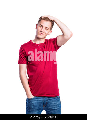 Garçon en jeans et t-shirt, jeune homme, studio shot Banque D'Images