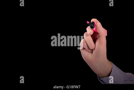 La main avec marqueur rose écrire une ligne Banque D'Images