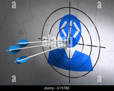 Logiciel Concept : les flèches en cible programmeur sur wall background Banque D'Images