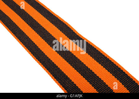 Ruban noir et orange de Saint Georges isolé sur fond blanc Banque D'Images