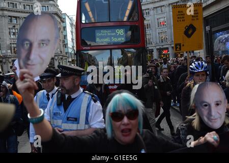 Londres, Royaume-Uni. 14 mai 2016. Les manifestants masqués jusqu'trafic sur Oxford Street. Crédit : Marc Ward/Alamy Live News Banque D'Images