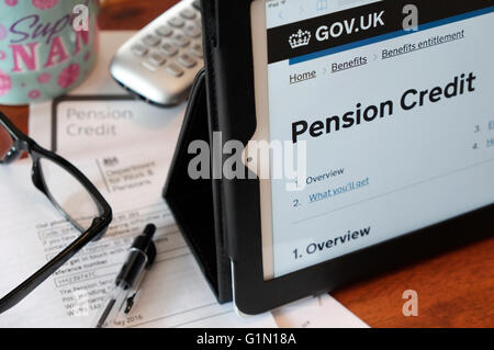 Crédit de pension de l'état sur l'ordinateur Tablet Banque D'Images