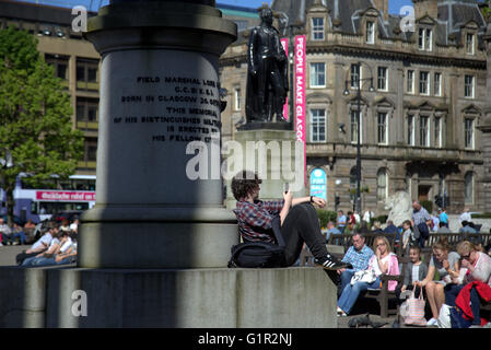 Journée ensoleillée avec Boy George Square,téléphone à Glasgow, Écosse, Royaume-Uni . Banque D'Images