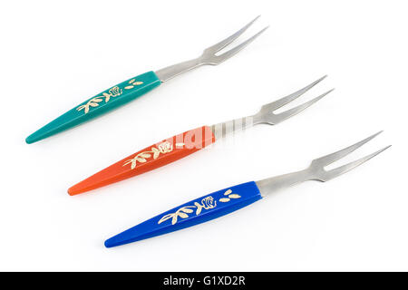 Petit gâteau forks isolated on white Banque D'Images