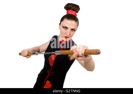 Femme drôle avec nunchucks isolated on white Banque D'Images