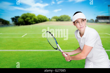 Image composite de l'athlète féminin jouant au tennis Banque D'Images