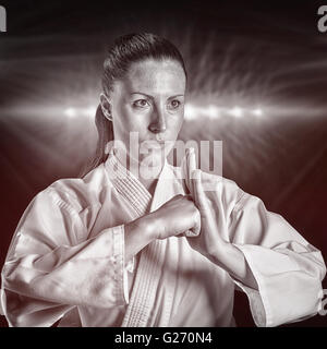 Image composite de salut de la main d'un chasseur de femmes Banque D'Images