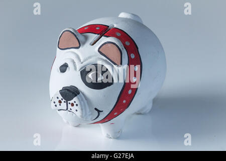 Peint chien tirelire Banque D'Images