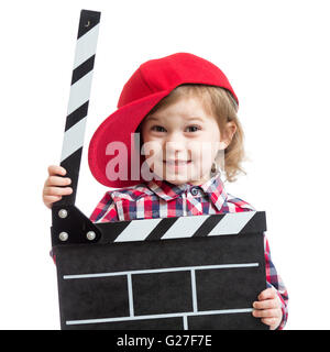 Enfant girl holding clapper board in isolated Banque D'Images