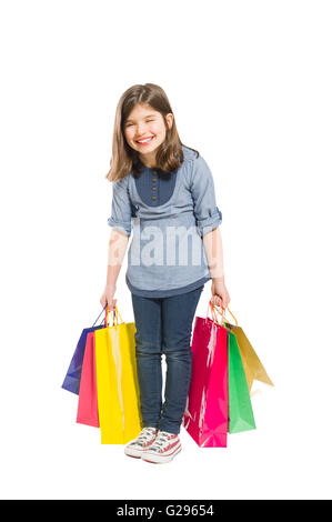 Professionnels et jeunes shopping girl laughing isolé sur fond blanc Banque D'Images