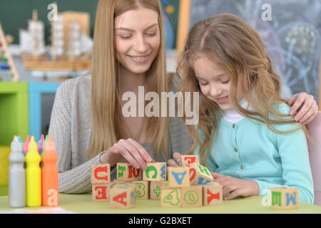 Mère et fille avec glaçons Banque D'Images