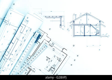 Espace de travail, plans d'architectes accueil plan et rouleaux avec règle de pliage Banque D'Images