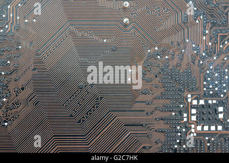 Fond brun de l'électronique de la carte mère d'ordinateur et de la technologie ont la théorie. Banque D'Images