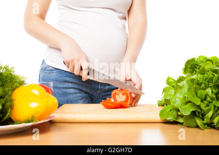 Tomate coupe femme méconnaissable Banque D'Images