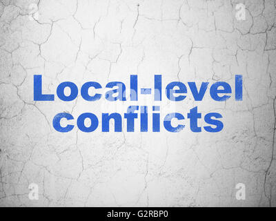 Concept : la politique des conflits au niveau local sur wall background Banque D'Images