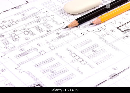 Les plans de construction de bâtiment de maison avec la calculatrice, crayon et compas Banque D'Images