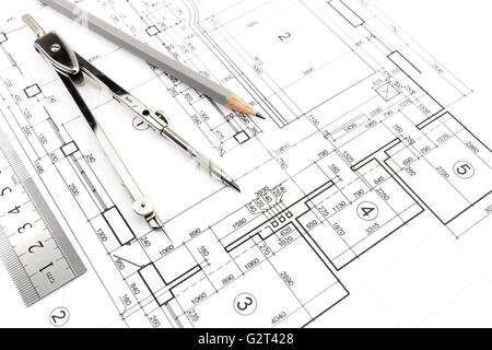 Les plans de construction de bâtiment de maison avec un crayon et un compas de dessin Banque D'Images