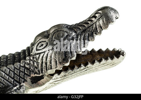 Une figurine crocodile métallique isolé sur fond blanc Banque D'Images