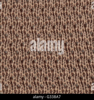 Tricot laine brun pastel de texture. Close up fragment de la vue d'en haut. Banque D'Images